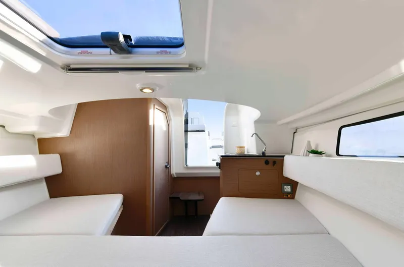 Slide: The Image of Interior of 2022 Leader 7.5 WA boat with modern seating and skylight. - 17