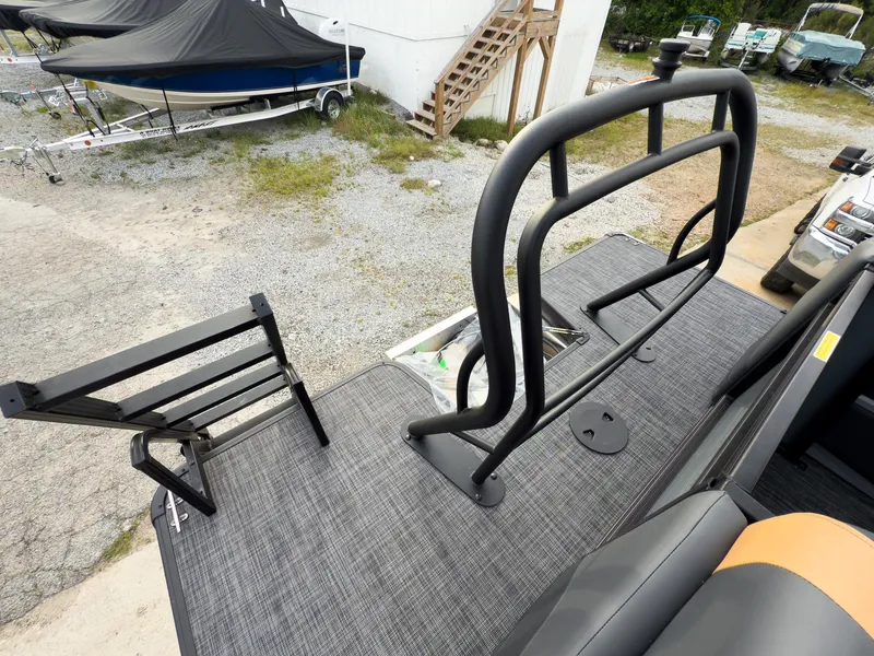 Slide: The Image of 2025 Godfrey Sweetwater 22' Tritoon rear deck with ladder and railing. - 23