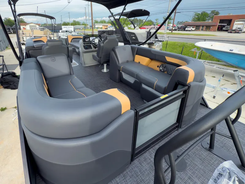 Slide: The Image of 2025 Godfrey Sweetwater 22' Tritoon with spacious seating and modern design. - 24