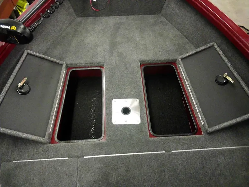 Slide: The Image of Interior of 2025 Ranger VS1665 SC boat with open storage compartments. - 15