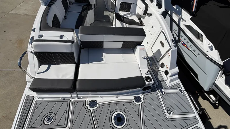Slide: The Image of 2025 Monterey M65 boat interior with sleek seating and modern design. - 11