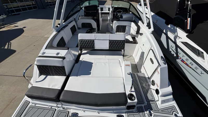 Slide: The Image of 2025 Monterey M65 boat interior with luxurious seating and modern design. - 15