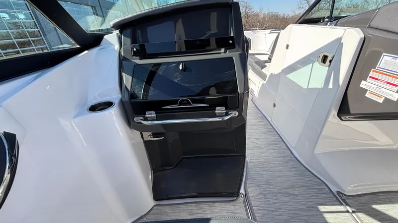 Slide: The Image of 2025 Monterey M65 boat interior with sleek dashboard and modern design. - 18