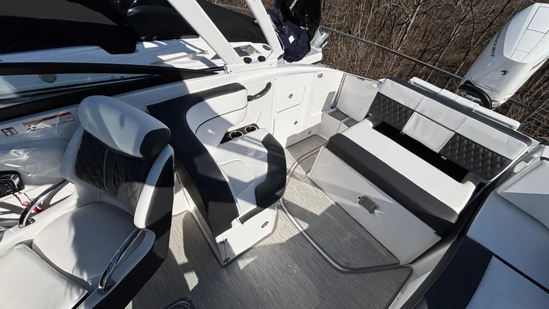 Slide: The Image of Luxurious interior of 2025 Monterey M65 boat with modern seating and sleek design. - 26