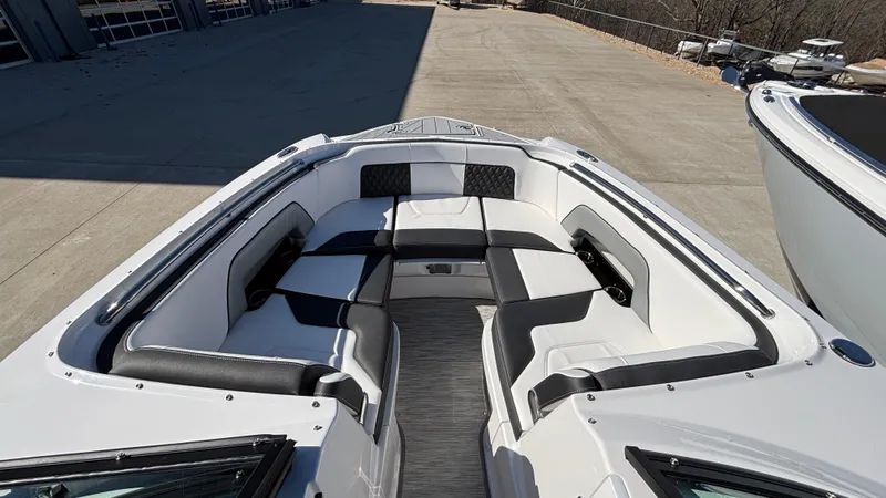 Slide: The Image of 2025 Monterey M65 boat interior with sleek seating and modern design. - 28