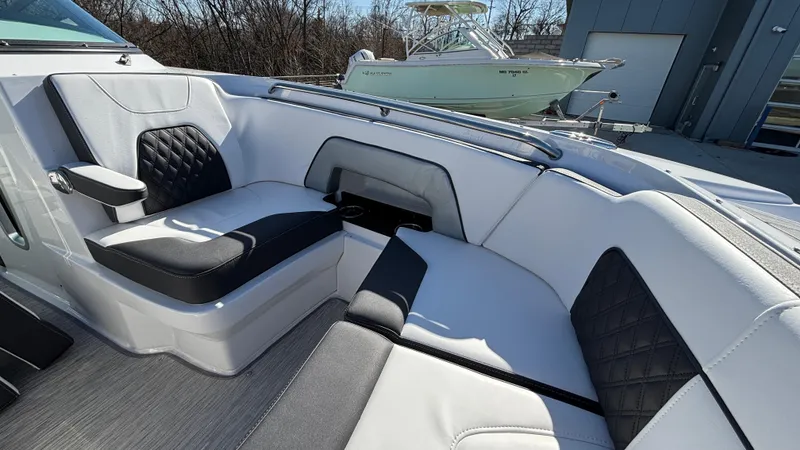Slide: The Image of Luxurious seating on 2025 Monterey M65 boat with modern design and black accents. - 33