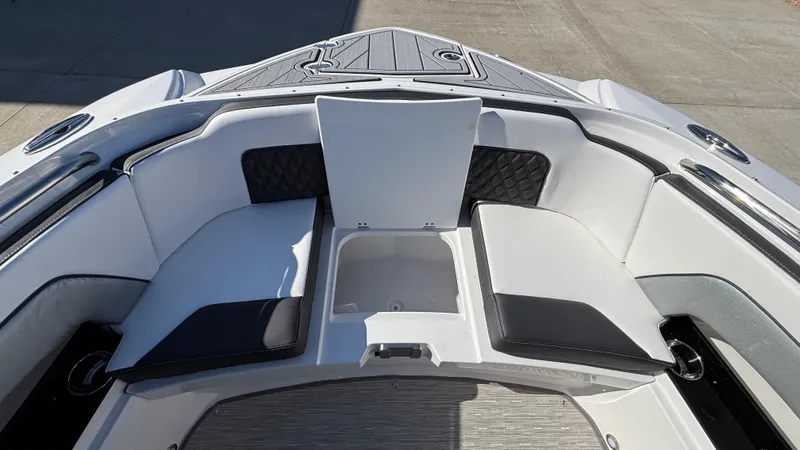 Slide: The Image of 2025 Monterey M65 boat interior with white and black seating, modern design. - 35