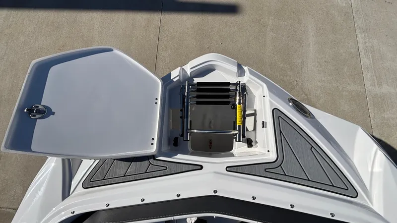 Slide: The Image of 2025 Monterey M65 boat with open hatch and ladder on deck. - 36
