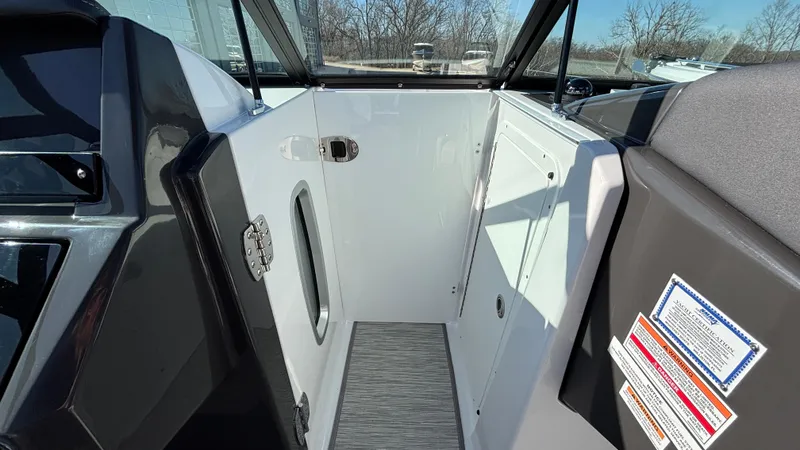 Slide: The Image of Interior view of 2025 Monterey M65 boat cabin with sleek design and modern features. - 44