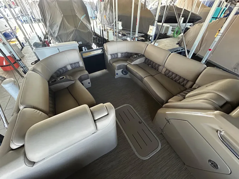 Slide: The Image of Luxurious seating on 2023 Bennington 25 QSBA pontoon boat, featuring plush upholstery and spacious layout. - 4