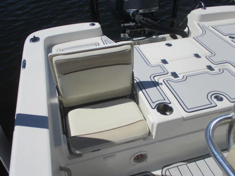 Slide: The Image of 2018 NauticStar 2400 Sport boat seat and deck detail. - 21