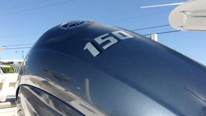 Slide: The Image of Outboard motor on 2025 Key West 210 Bay Reef boat, featuring "150" horsepower. - 13
