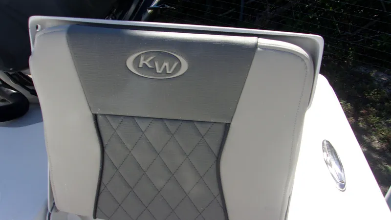 Slide: The Image of Key West 210 Bay Reef 2025 boat seat with KW logo and diamond pattern. - 20