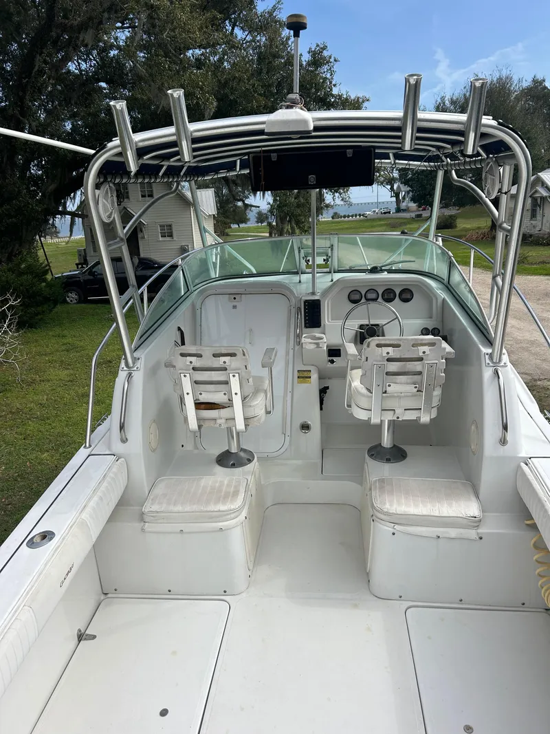 Slide: The Image of 2001 Glacier Bay Island Runner boat interior with dual seats and steering console. - 10