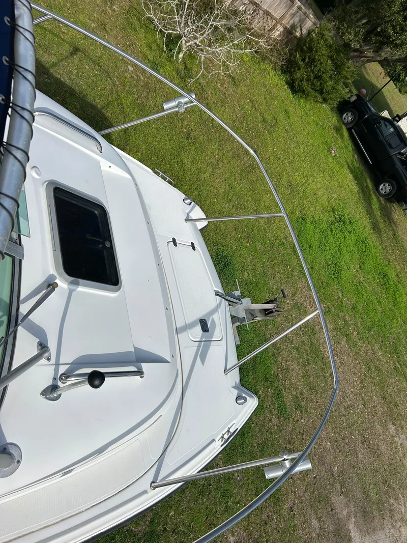 Slide: The Image of 2001 Glacier Bay Island Runner boat on grass, viewed from above. - 14
