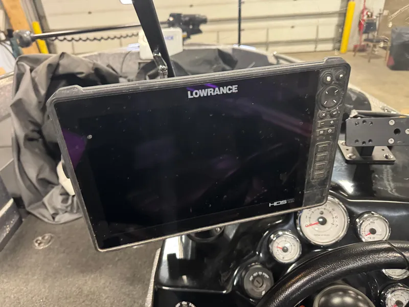 Slide: The Image of Lowrance HDS display on 2021 Nitro ZV19 Sport dashboard with gauges. - 11