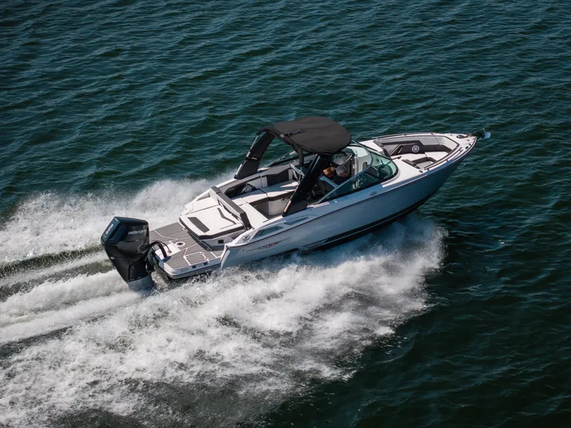 Slide: The Image of 2025 Monterey 275 SS Bowrider cruising on open water, showcasing sleek design and performance. - 3