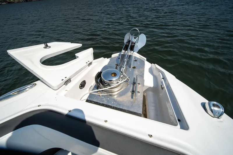 Slide: The Image of 2025 Monterey 275 SS Bowrider boat anchor system on calm water. - 6