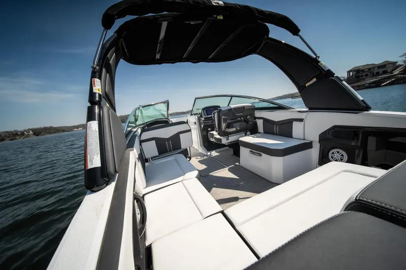 Slide: The Image of 2025 Monterey 275 SS Bowrider interior with spacious seating on a sunny day. - 16