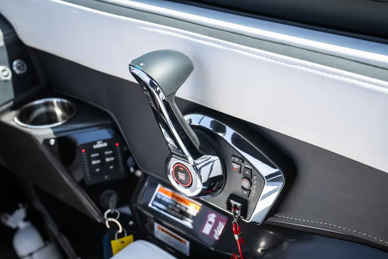 Slide: The Image of 2025 Monterey 275 SS Bowrider throttle control and dashboard details. - 21