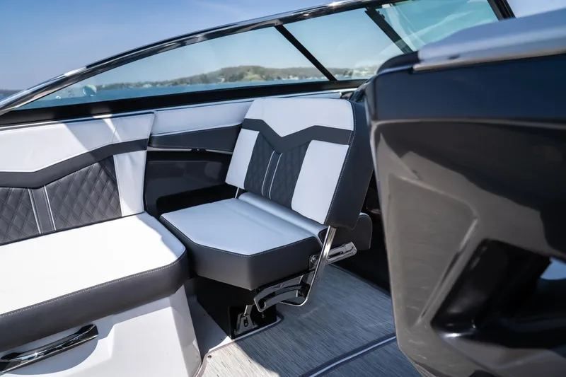 Slide: The Image of 2025 Monterey 275 SS Bowrider interior with sleek, modern seating and stylish design. - 25
