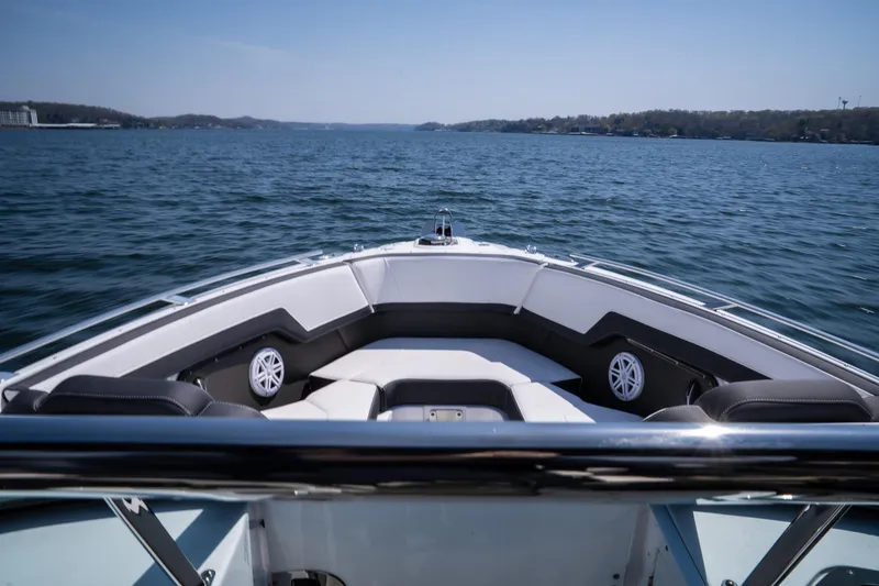 Slide: The Image of 2025 Monterey 275 SS Bowrider on open water, showcasing spacious seating and sleek design. - 28