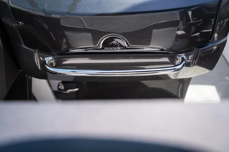 Slide: The Image of 2025 Monterey 275 SS Bowrider dashboard with sleek design and chrome accents. - 29