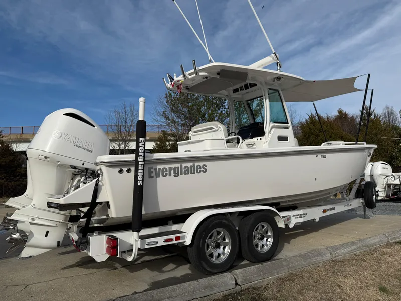 Slide: The Image of 2020 Everglades 273 Center Console boat on trailer, featuring Yamaha outboard motor. - 4