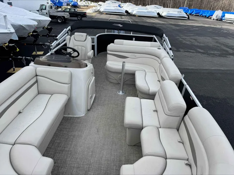 Slide: The Image of 2016 Bennington 22SLXP pontoon boat with spacious seating and modern design. - 8