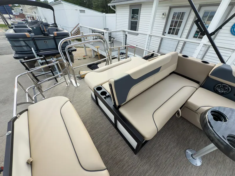 Slide: The Image of 2025 Godfrey Sweetwater 22' Flip Lounge Tritoon with beige seating and modern design. - 19