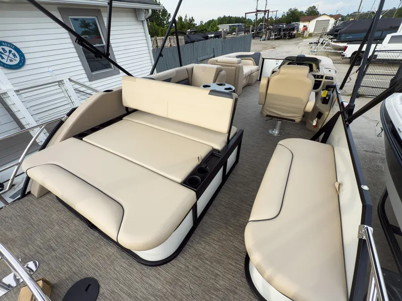 Slide: The Image of 2025 Godfrey Sweetwater 22' Flip Lounge Tritoon with beige seating and modern design. - 25