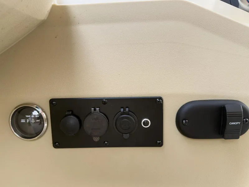 Slide: The Image of Control panel of 2025 Godfrey Sweetwater 22' Flip Lounge Tritoon boat. - 8