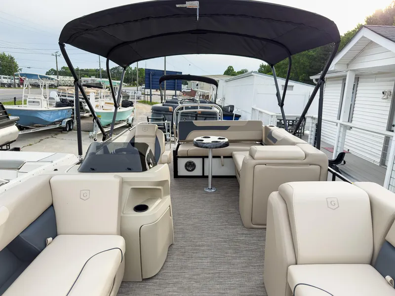Slide: The Image of 2025 Godfrey Sweetwater 22' Flip Lounge Tritoon with spacious seating and canopy. - 9