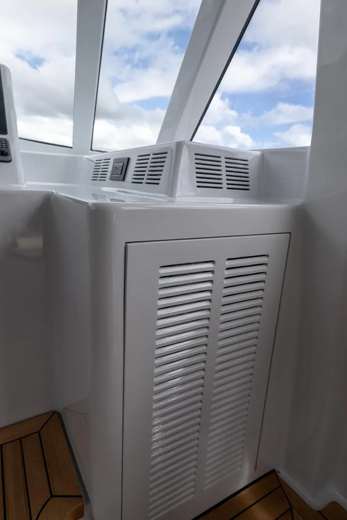 Slide: The Image of Helm A/C Cabinet - 23