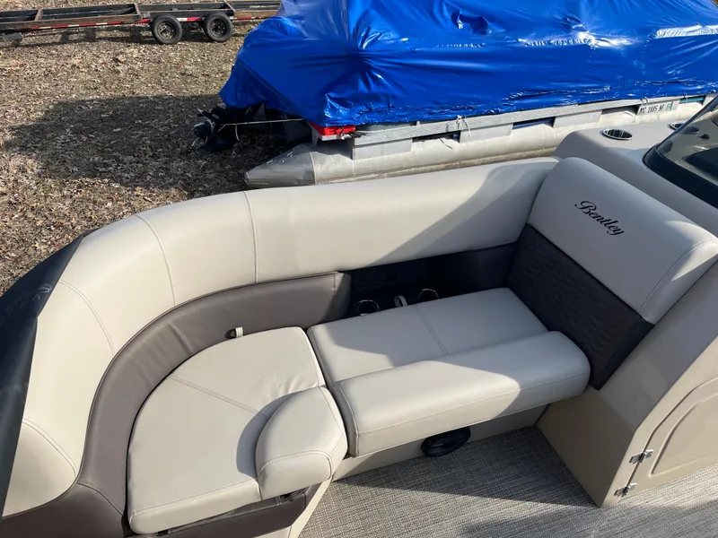 Slide: The Image of 2025 Bentley Pontoons 223 ELITE ADMIRAL interior with luxurious seating and sleek design. - 12