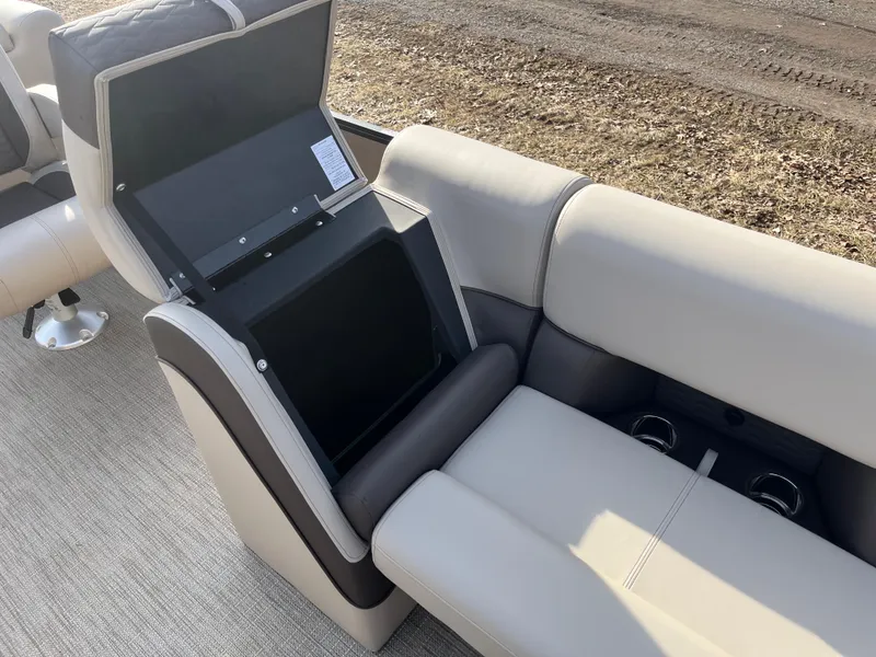 Slide: The Image of 2025 Bentley Pontoons 223 Elite Admiral interior with open storage compartment. - 17