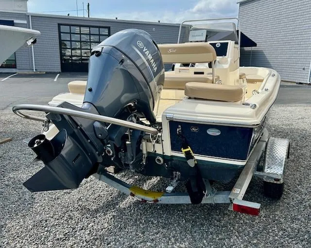 Slide: The Image of 2023 Scout 175 Sportfish boat with Yamaha outboard motor on a trailer. - 3