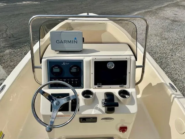 Slide: The Image of 2023 Scout 175 Sportfish boat dashboard with Garmin navigation system. - 5