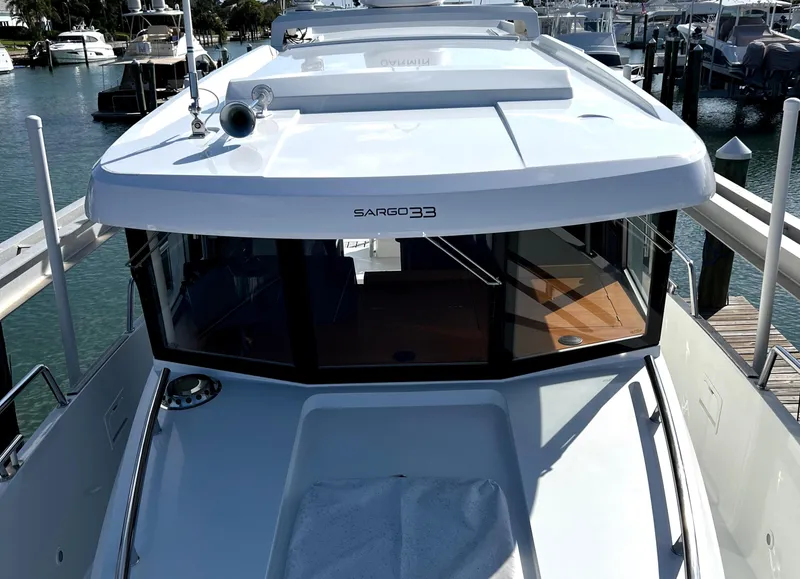 Slide: The Image of 2019 Sargo 33 All Season boat docked at a marina. - 4