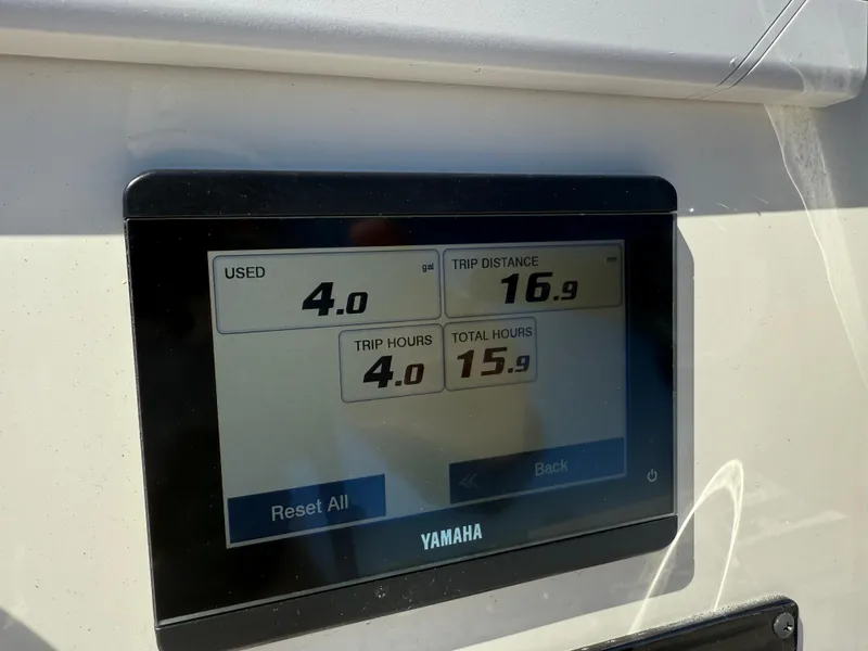 Slide: The Image of Yamaha display showing trip data on 2024 Hewes 18 Redfisher boat. - 9