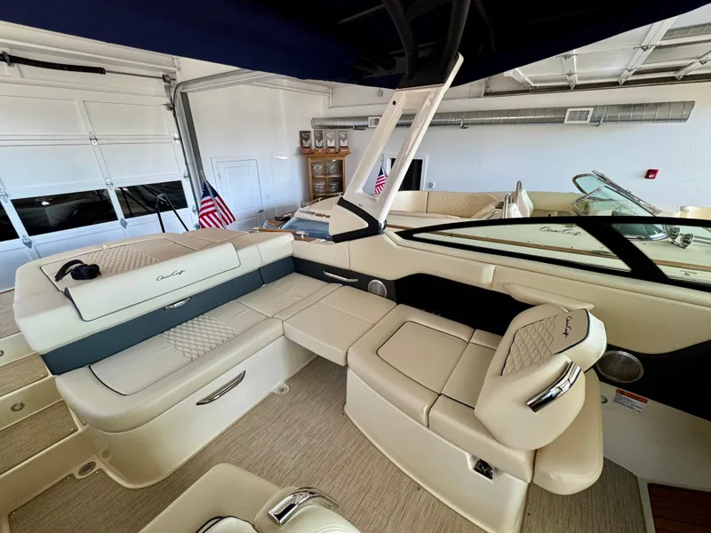 Slide: The Image of 2025 Chris-Craft Sportster 25 boat interior with luxurious seating and modern design. - 12