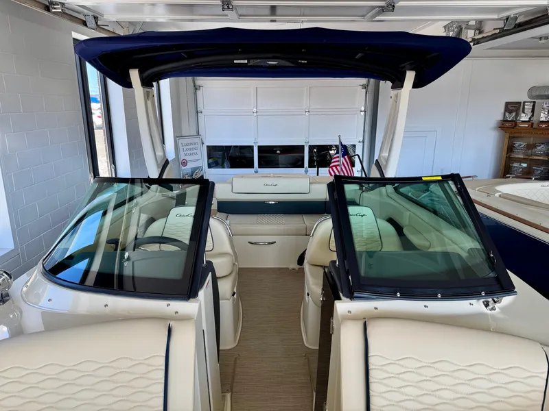 Slide: The Image of 2025 Chris-Craft Sportster 25 boat interior with luxurious seating and modern design. - 18