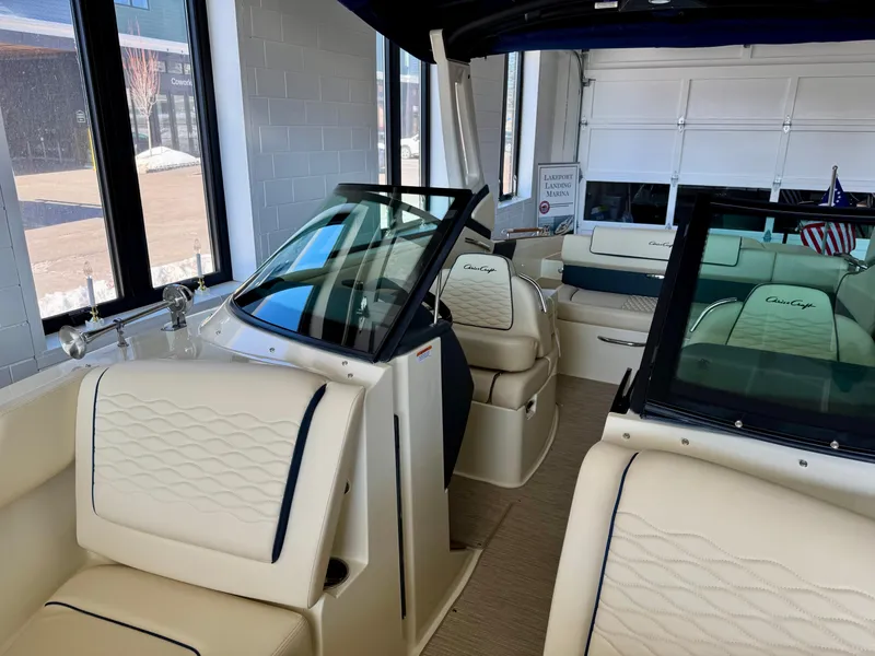 Slide: The Image of 2025 Chris-Craft Sportster 25 interior with luxurious seating and modern design. - 20