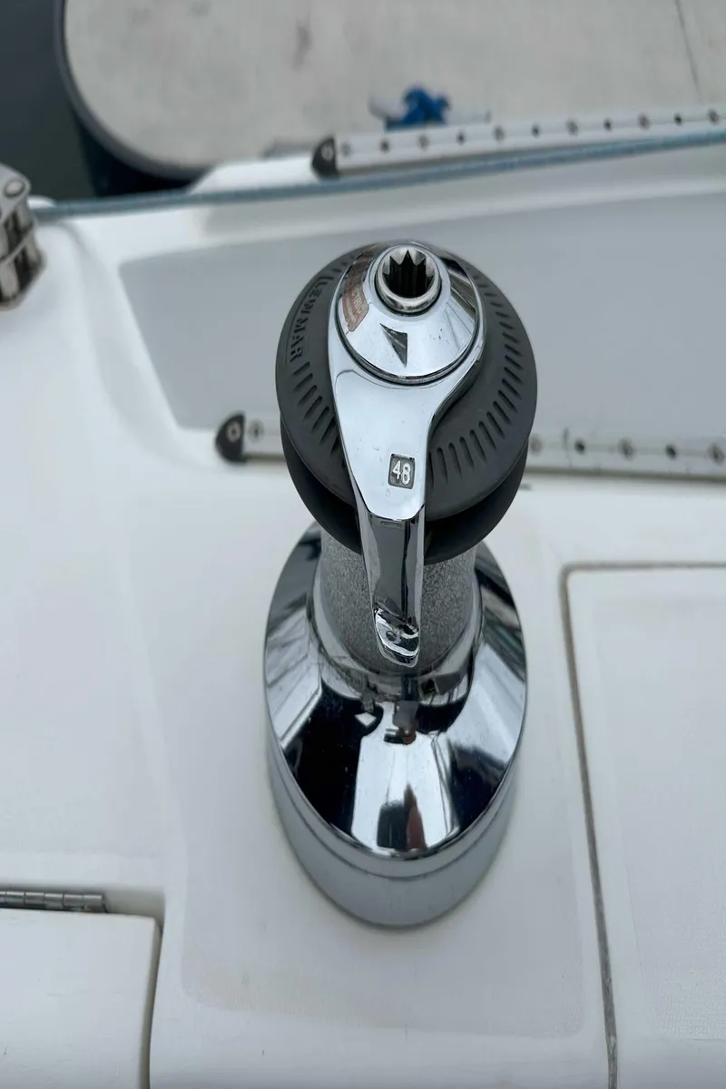 Slide: The Image of Catalina 34 MkII 2007 sailboat winch, chrome finish, close-up view. - 11