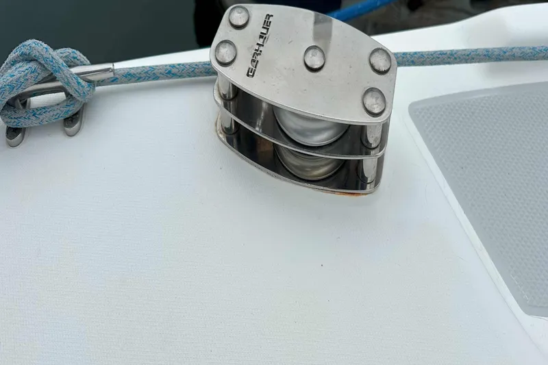 Slide: The Image of Pulley system on 2007 Catalina 34 MkII sailboat deck with blue rope. - 12