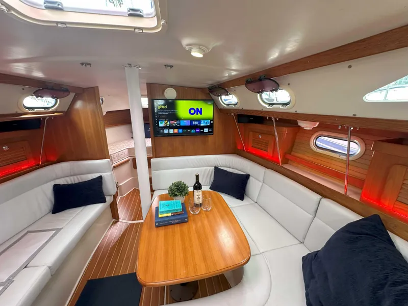 Slide: The Image of Interior of 2007 Catalina 34 MkII sailboat with cozy seating and modern amenities. - 22