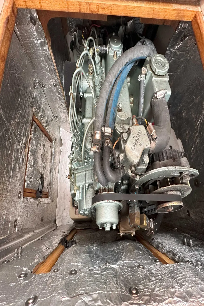Slide: The Image of Catalina 34 MkII 2007 engine compartment with visible mechanical components. - 25