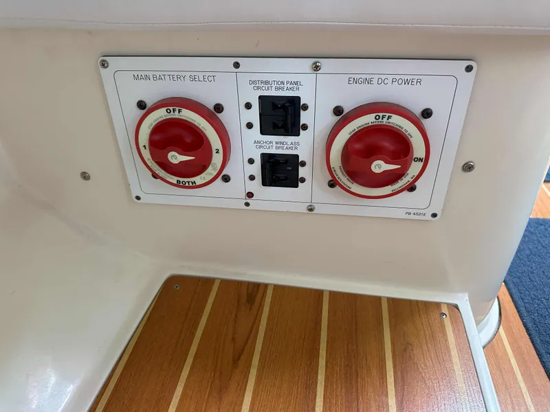Slide: The Image of Control panel of a 2007 Catalina 34 MkII sailboat with battery switches. - 26