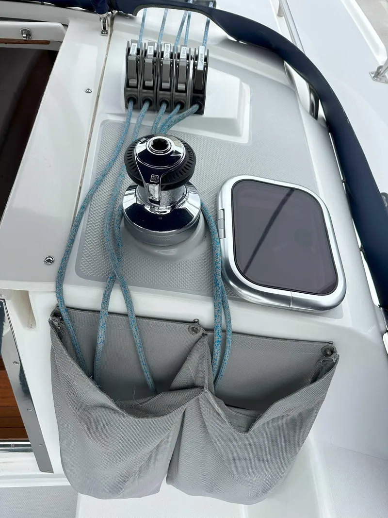Slide: The Image of Sailboat deck of 2007 Catalina 34 MkII with winch, ropes, and storage pockets. - 6