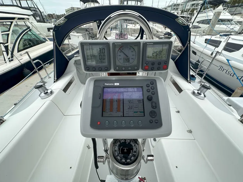 Slide: The Image of Cockpit of 2007 Catalina 34 MkII sailboat with navigation instruments and compass. - 7